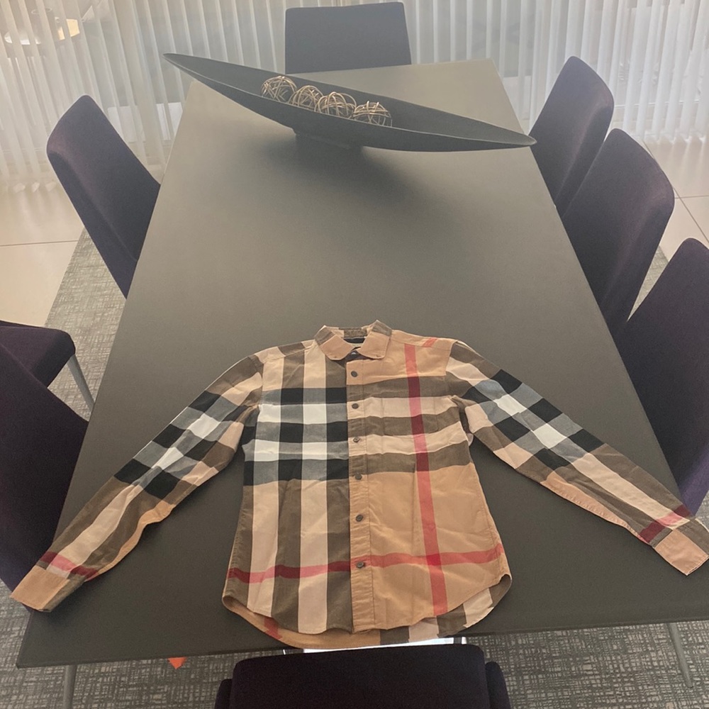 Burberry Brit Classic Timeless piece in a size XS. Good for the holidays.